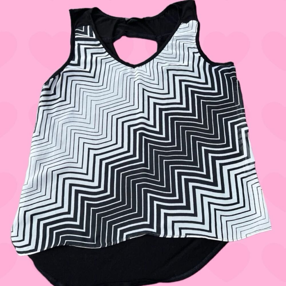 B. Wear sleeveless  hi-low top, cutout in back women's size L, Like new